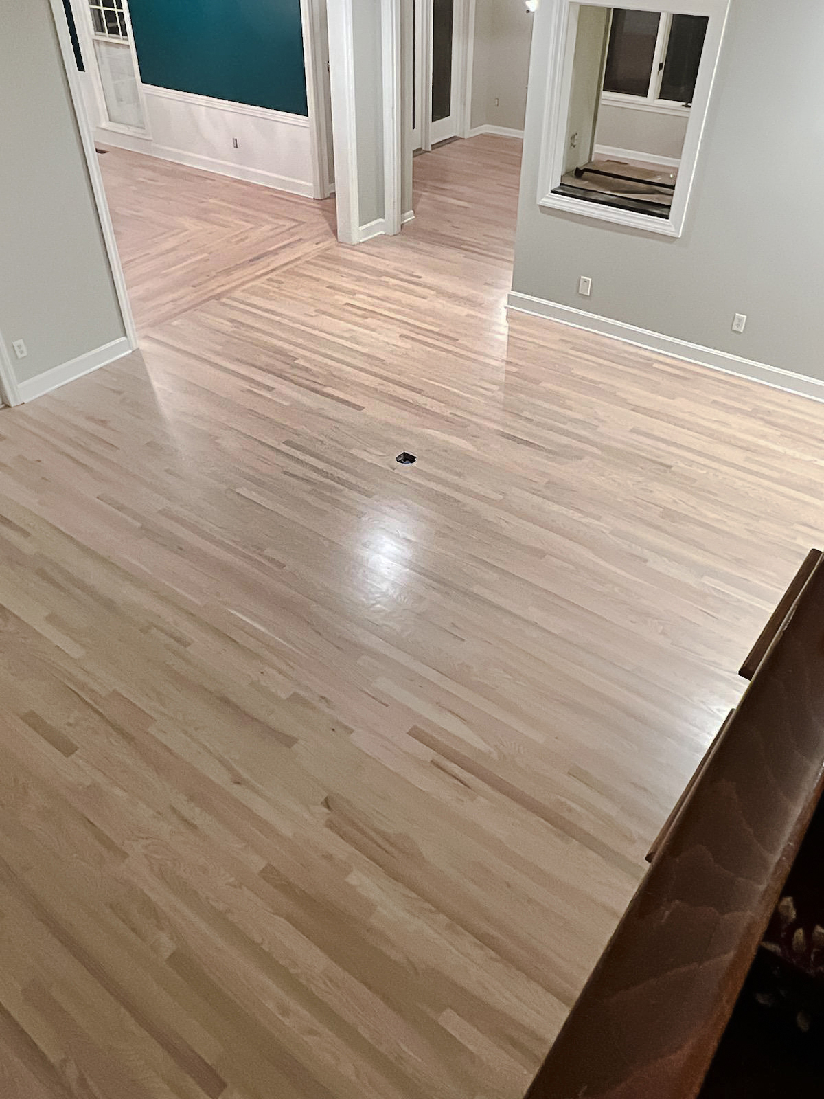 Solid red oak installation with light natural finish