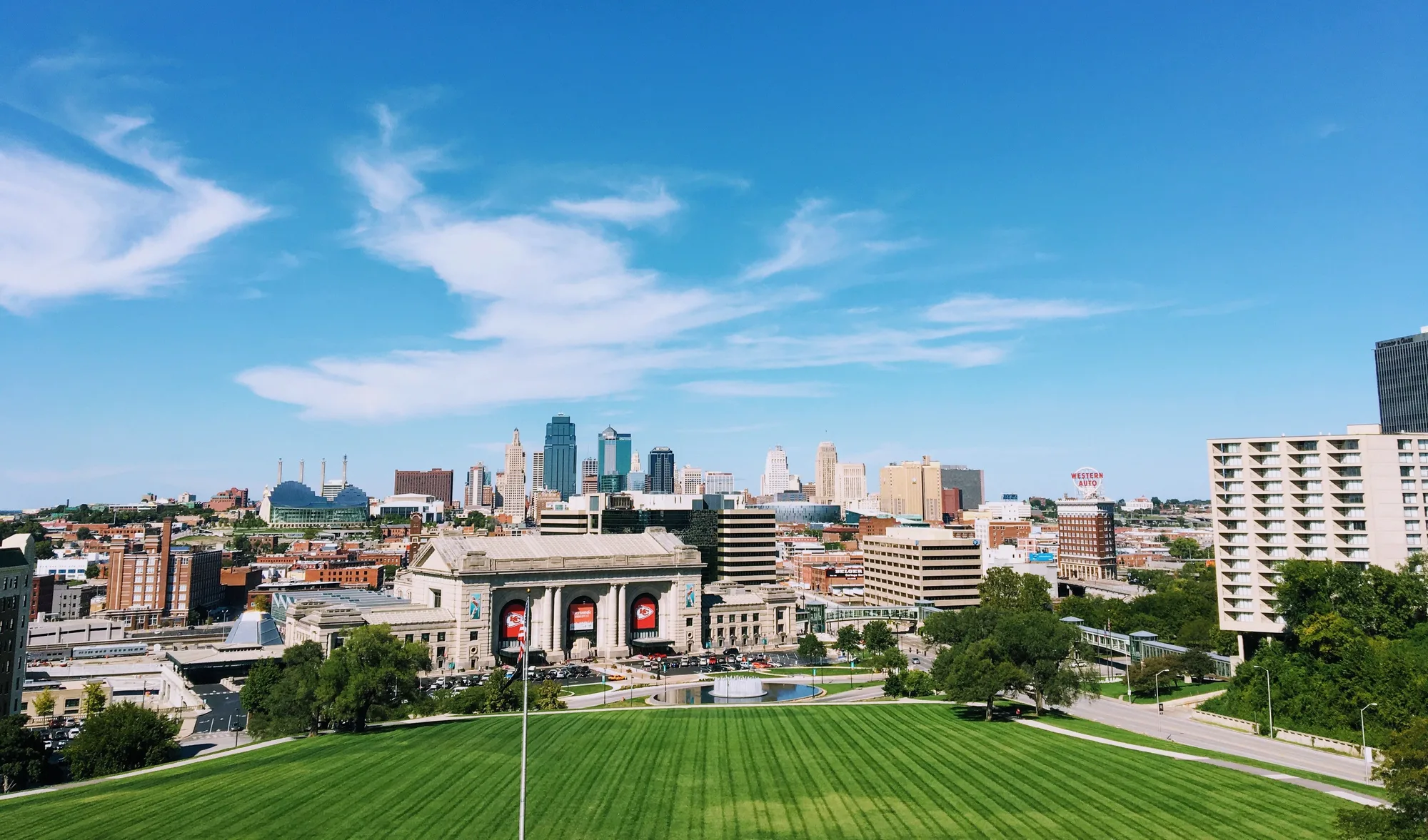 The Kansas City skyline and Union Station seen from the south on a clear day, across the metro Midwest Flooring Company serves